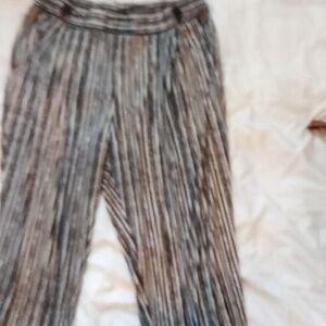 Robert Louis 3X pants 82%polyester 8% spandex, material is soft.